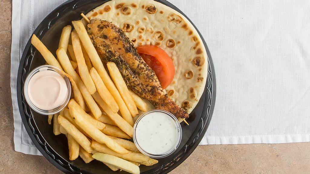 Chicken Souvlaki · Souvlaki (shishkebab) made with tender pieces of chicken breast, Greek spices and lemon; served with tzatziki, tomato, pita bread, and french fries or rice pilaf.