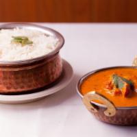 65) Chicken Tikka Masala · Cubes of chicken breast cooked in creamy spiced tomato sauce.