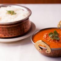 62) Butter Chicken · Boneless white meat chicken cooked in tomato creamy sauce.