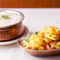 76) Aloo Gobi (Nd)(Gf) · Non-dairy and gluten-free. Cauliflower with potatoes cooked with fresh ginger, onions and sp...