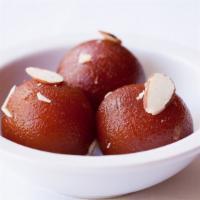 124) Gulab Jamun · Milk or cheese balls served in rose flavored sugar syrup with a touch of cardamom.