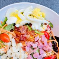 Chef Salad · Mixed Greens, turkey, ham, bacon, cheese, egg, tomato