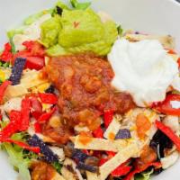 Southwest Salad · Mixed greens, corn, black beans, chicken, tomato, salsa, tortilla strips