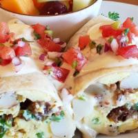 Breakfast Burrito · Cheesy, bacon potato breakfast burrito. Stuffed with bacon, eggs, our house made gourmet thi...