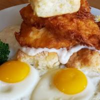 Buttermilk Chicken N' Biscuits  · Buttermilk fried chicken breast on top of our homemade biscuits, topped with gravy and two e...