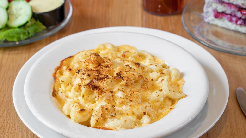 Baked Mac & Cheese · A TWIST ON THE TRADITIONAL FAVORITE – A THICK WHITE CREAM SAUCE HOMEMADE FROM SCRATCH, COMBINED WITH TILLAMOOK CHEDDAR CHEESE AND TOPPED OFF WITH BREAD CRUMBS. BAKED TO ORDER