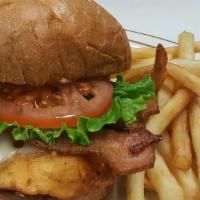 Crispy Chicken Blt · Our house battered fried chicken breast with our homemade roasted southern aioli, melted Swi...