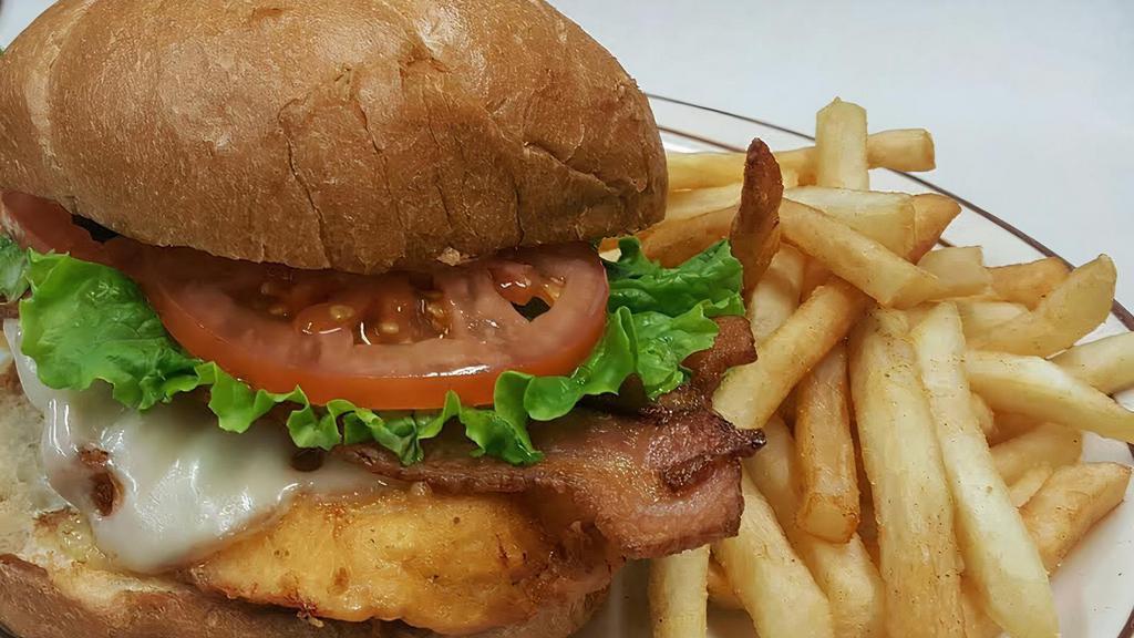Crispy Chicken Blt · Our house battered fried chicken breast with our homemade roasted southern aioli, melted Swiss cheese, bacon, lettuce and tomatoes.