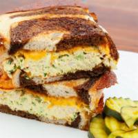 Tuna Melt · Classic tuna salad grilled on marbled rye with the cheese skirt!