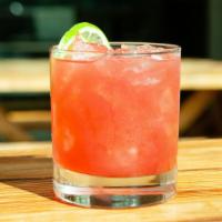 Parkside Margarita · Hornitos cristalino, grand marnier, mixed berry syrup, mint, basil, lime juice.