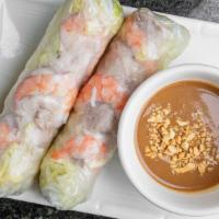 Spring Rolls (2 Pieces) - Goi Cuon · Rice papers wrap with steamed shrimps, pork,  lettuce, and rice noodles. Served with peanut ...