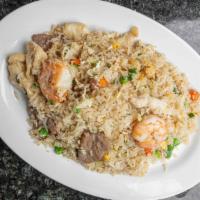 Fried Rice - Com Chien · Mixed vegetables with choice of chicken, beef or tofu. Choice of shrimp or combo (shrimp, be...