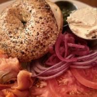 Deconstructed Bagel & Lox · Everything bagel, salmon lox, herbed cream cheese, tomato, shaved red onion, capers.
