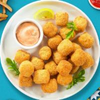 Food For Tots · (Vegetarian) Shredded Idaho potatoes formed into tots, battered, and fried until golden brow...