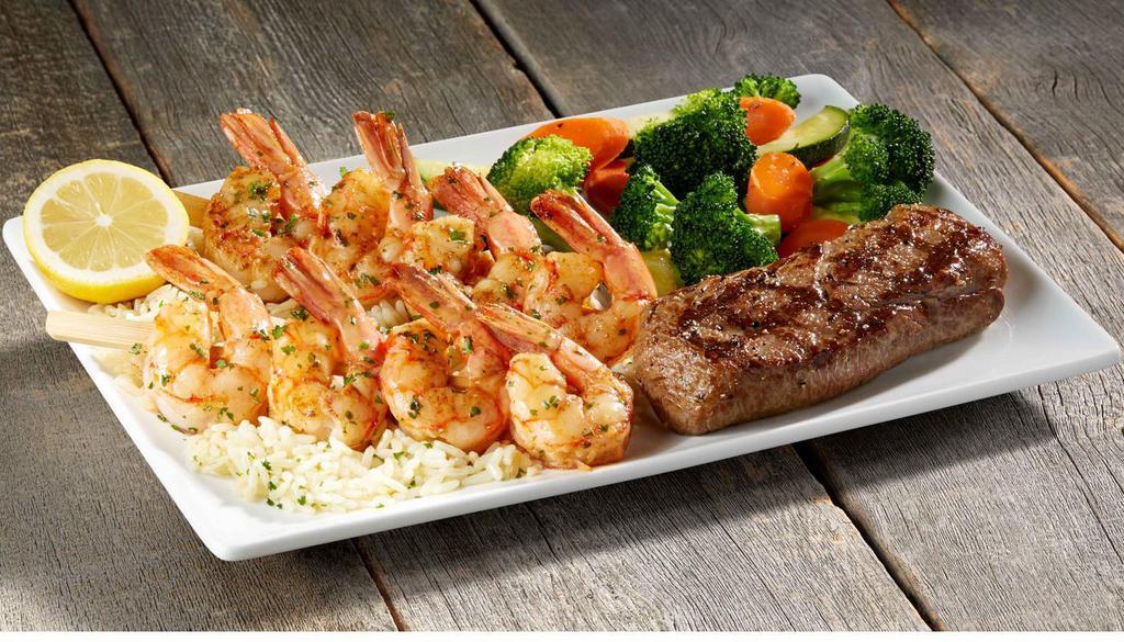 Steak & Broiled Shrimp Skewers  · All-natural wild-caught jumbo shrimp served with a hand-cut tri-tip sirloin and choice of side