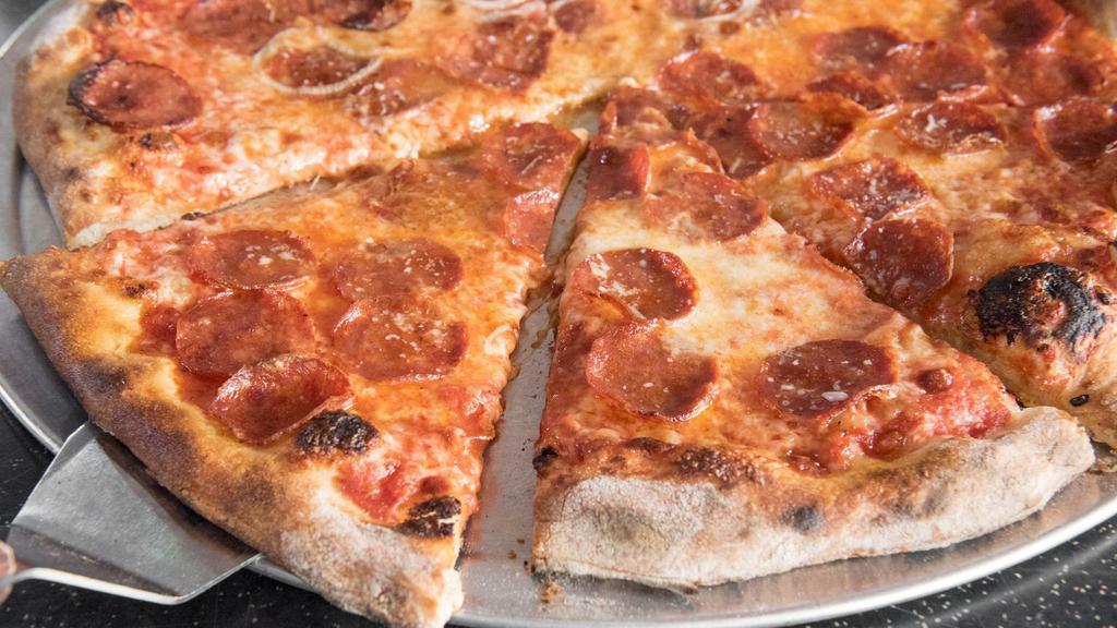 Round Pepperoni Pizza · Tomato sauce, fresh, and aged mozzarella, parm, and Zoe's pepperoni.