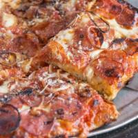 Square Hot Salami Pizza · Tomato sauce, fresh and aged mozzarella, Zoe's spicy salami and onions.