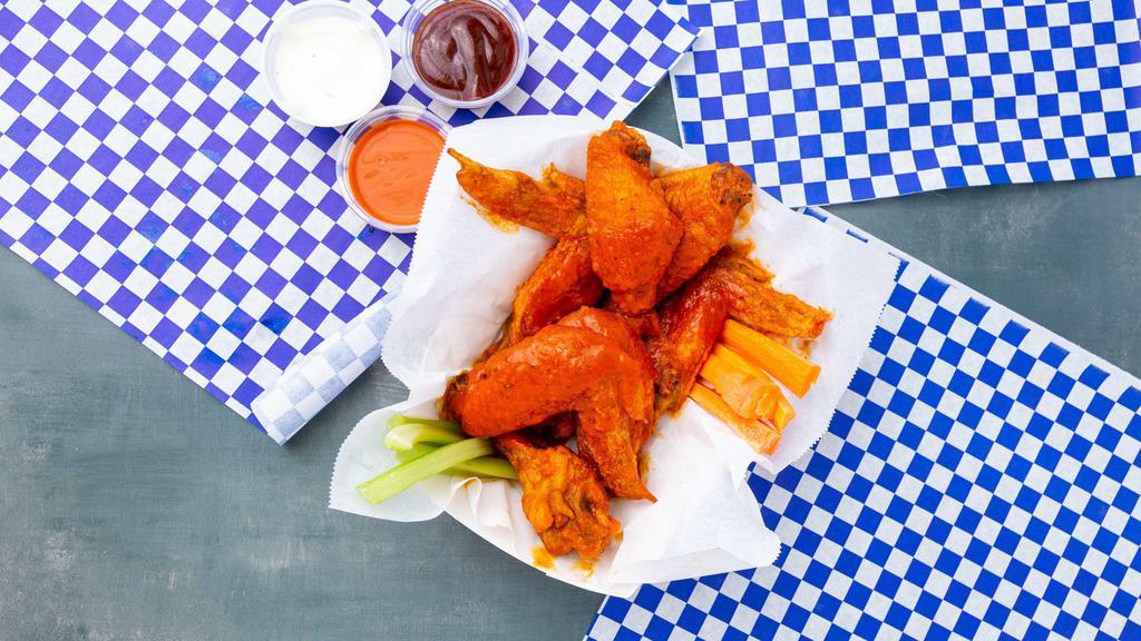 Wings Combo (6 Pieces) · Available traditional or boneless. Served with ranch or blue cheese. Served with soft drink and crispy tots. Served with celery and jicama.