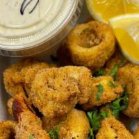 L.O.C (For Lovers Of Calamari) · Hearts of Palm. Battered in our Zesty house spice blend served with our incredible house-mad...