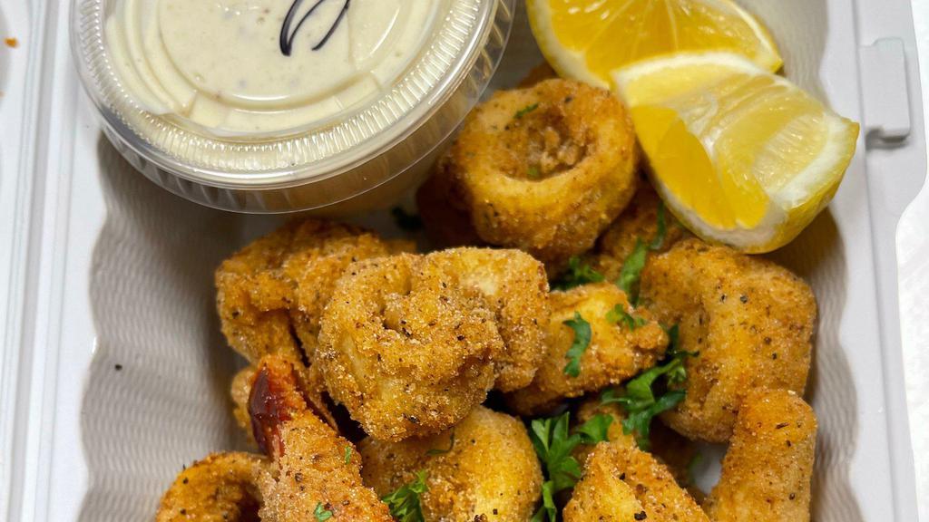 L.O.C (For Lovers Of Calamari) · Hearts of Palm. Battered in our Zesty house spice blend served with our incredible house-made Garlic Aioli.