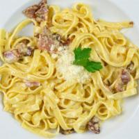 Carbonara · signature white sauce made upon order with cream, bacon, organic egg, freshly grated  Italia...