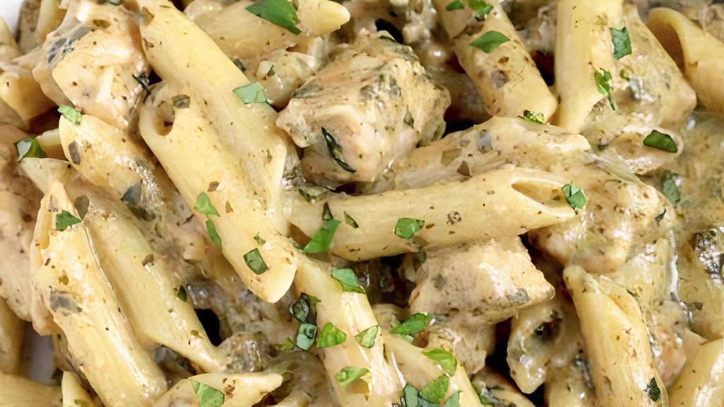 Creamy Pesto · a flavorful sauce made with our house made pesto* sauce and cream, chicken, organic: garlic, basil and tomatoes, freshly grated  Italian parmesan cheese