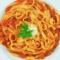 Al Pomodoro · real tomato sauce, organic garlic, freshly grated  Italian parmesan cheese