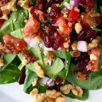 Spinach Salad Small · fresh spinach greens, dried cranberries, walnuts, red onions, bacon, tomatoes, & homemade ba...