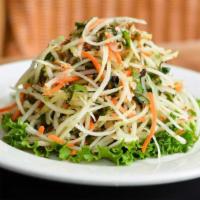 Papaya Salad · Shredded green papaya and carrot, aromatic Southeast Asian herbs, fried shallot, peanuts and...