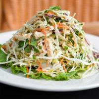 Chicken Chieu · Thinly sliced green and red cabbage, carrot, cilantro, tri-mint, peanuts and fried shallots ...