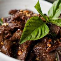 7 Flavor Beef · A favorite from Vietnam. Flank steak fragrant with the seven flavors of lemongrass, peanuts,...