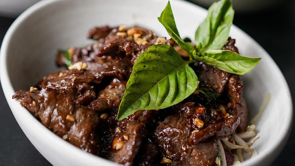 7 Flavor Beef · A favorite from Vietnam. Flank steak fragrant with the seven flavors of lemongrass, peanuts, chilies, hoisin, basil, garlic, and ginger.
(cannot be made gluten free)
(Spice level cannot be modified, contains chili in the marinade which cannot be omitted) )