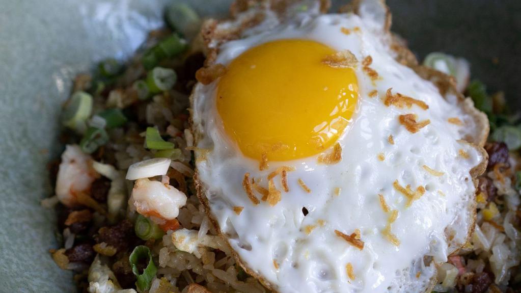 Chinese Sausage & Shrimp Fried Rice · Chinese sausage, shrimp, peas, carrots, egg, scallions, ginger, and topped with a fried egg.