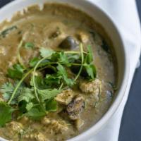 Green Curry Chicken · A classic Thai curry rich in green chili and galangal and kaffir lime peel. Finished with co...