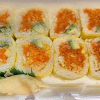Yuki Roll · Spicy salmon, spicy white tuna, avocado, mango, crunch and caviar wrapped with soybean paper.