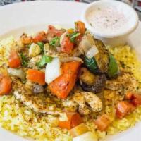 Taste Of Africa · Tender Chicken Breast served with charbroiled vegetables, topped with Sautéed garlic, onions...