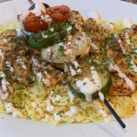Chicken Kabob · Filet of Chicken Tenders, seasoned in our house spices. Charbroiled with Veggie Kabob. Serve...