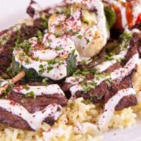 Beef  Kabob · Halal. Slices of Beef Top Sirloin, seasoned In our original house spices. Charbroiled with V...