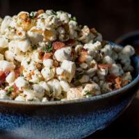 Bacon Popcorn · Additive, slightly buttered and impossible to eat just one; Gluten Free