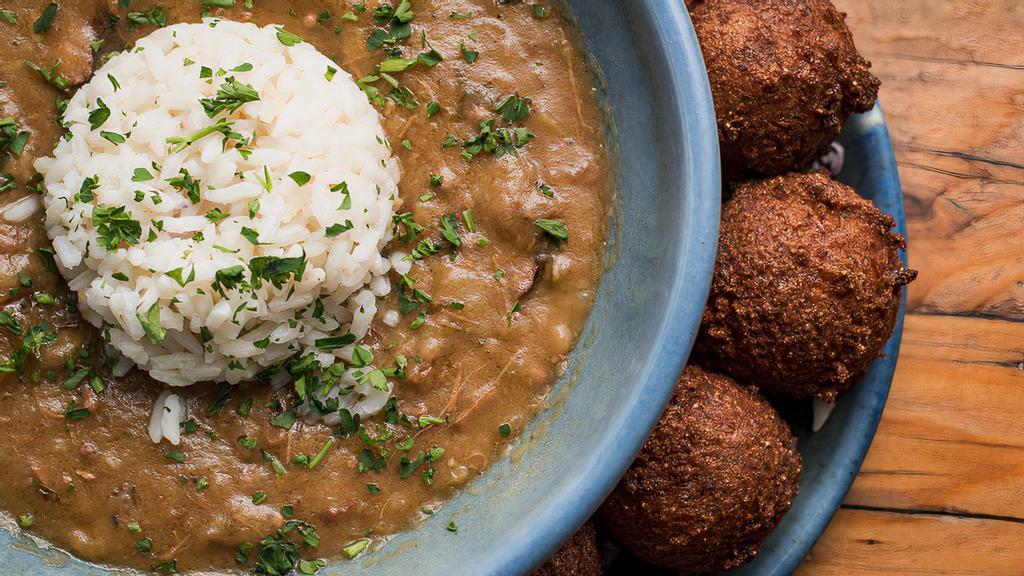 Guedry'S Gumbo · Chicken, Andouille sausage, rice, husphpuppies