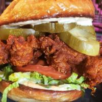 Nashville Hot Chicken Sandwich · Fried thigh, remoulade, jabanero pickles, lettuce, tomato