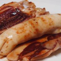 Butter Grilled Squid 버터오징어 · Butter grilled squid with house spicy sauce.