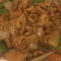 Cashew Chicken · White meat. Stir fry chicken breast in a house wine sauce and top with crunchy cashews.