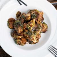 Fried Brussels Sprouts · Tossed in house garlic sauce.