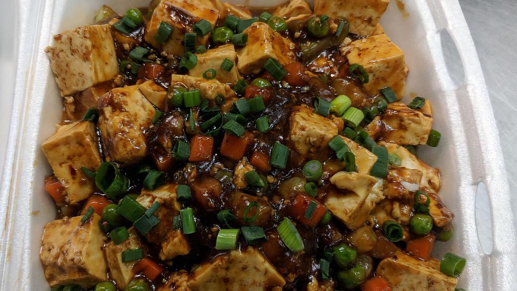 Shrimp & Pork Mapo Tofu · Bean curd, shrimp, pork with tofu in a spicy, and savory sauce. Served with steamed rice.