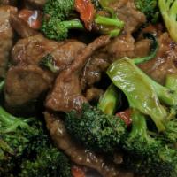 Beef With Broccoli · Mom's secret recipe to make you eat your broccoli. Served with steamed rice.