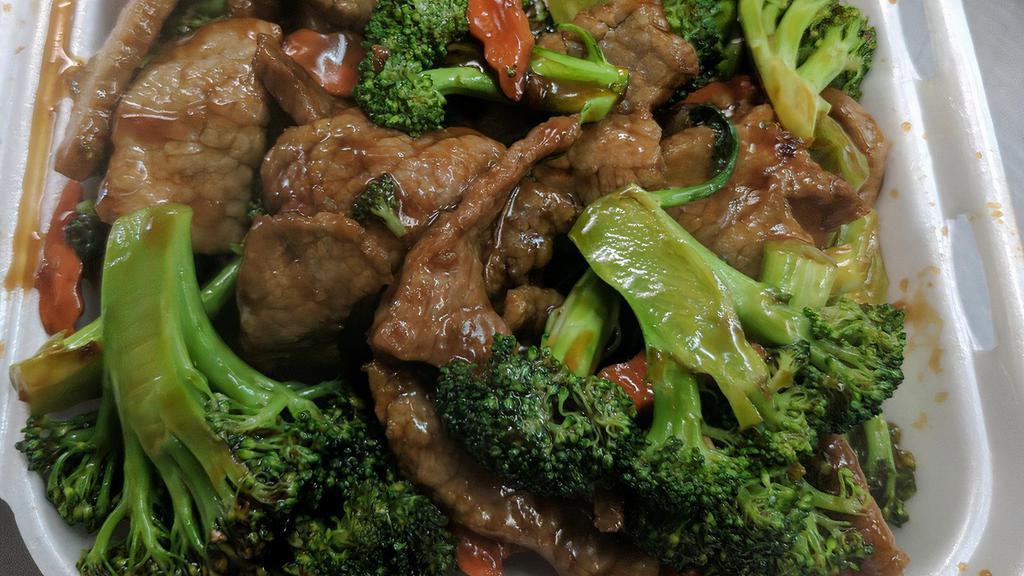 Beef With Broccoli · Mom's secret recipe to make you eat your broccoli. Served with steamed rice.
