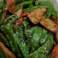 Beef With Snow Peas · Served with steamed rice.