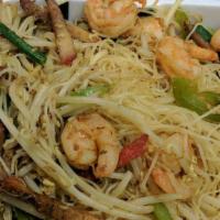 Singapore Rice Noodles · ​Cantonese style. Rice noodles with spicy curry spices. Roast pork and shrimp.