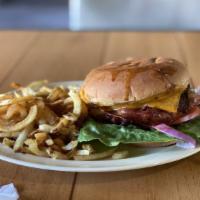 Maui Burger · Choose either a 1/3 or 1/2 lb. patty.  Comes with grilled ham, pineapple and bacon, smothere...